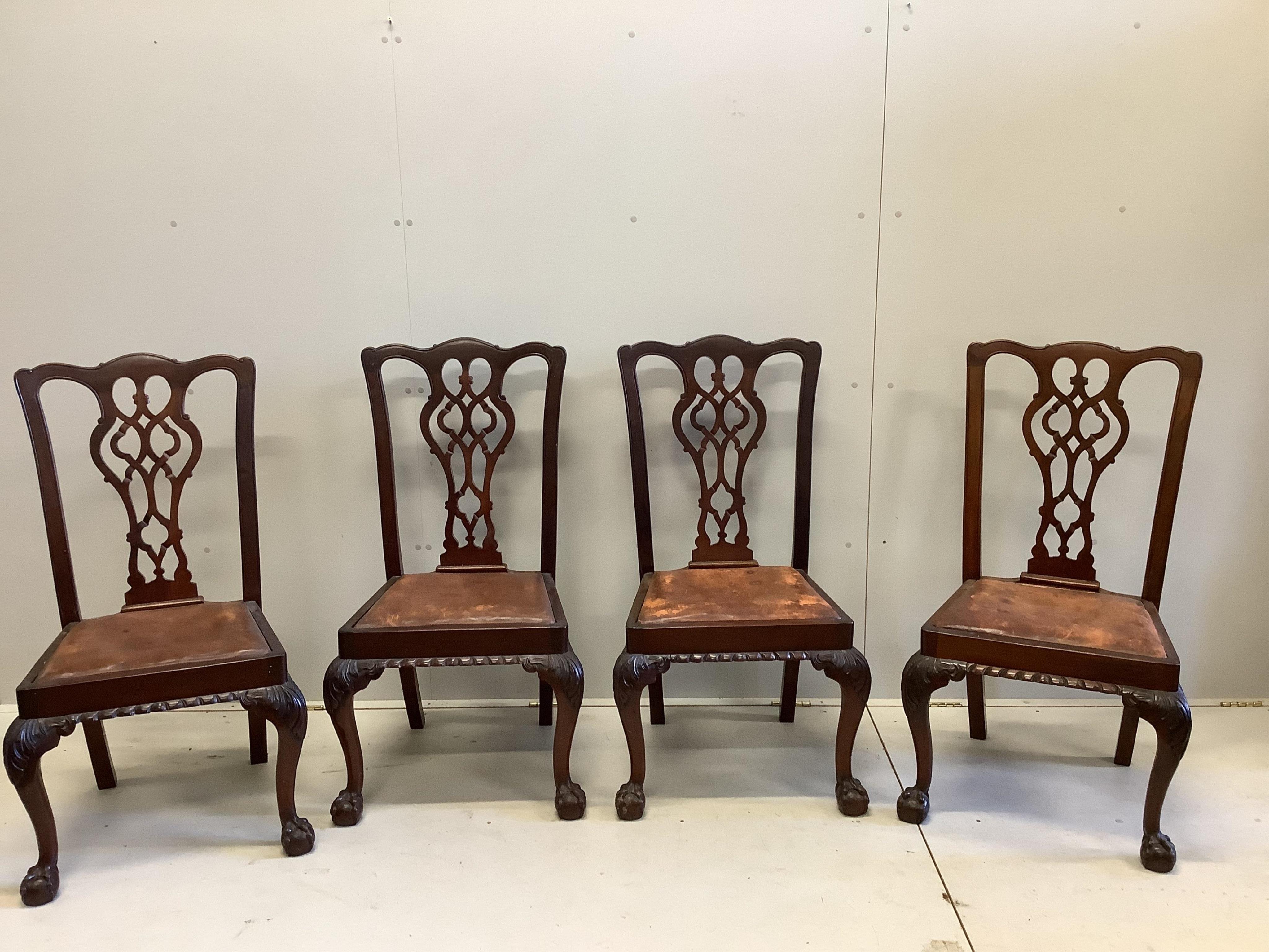 A Chippendale Revival rectangular mahogany table, width 152cm, depth 96cm, height 78cm and four chairs. Condition - fair